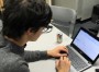 SAIL High School junior Ram Moore is the lead programmer for the OctoPiRates. Credit: Lynn Hatter/WFSU.